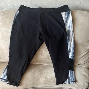 Exercise pants. Hit right below the knee. Fold over at waist with grey/white